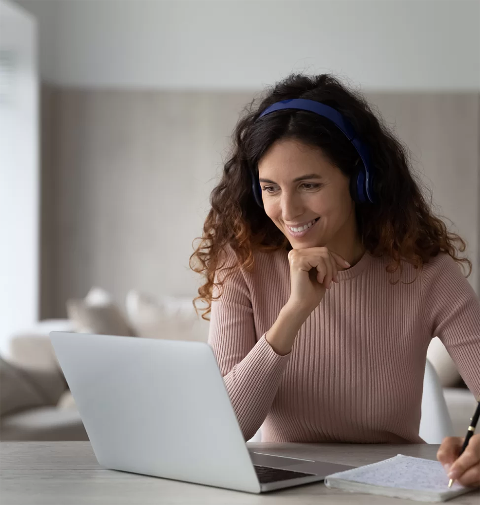 Virtual Therapy - Happy woman on computer